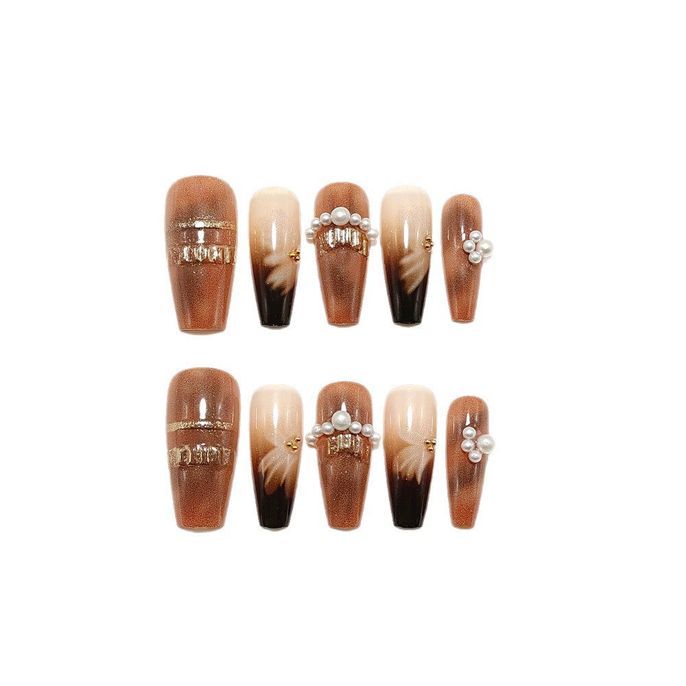 Artificial nails with glamorous gold and pearl embellished accents Acalora