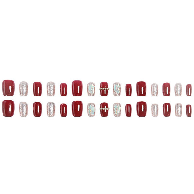 Glamorous artificial nail set with sparkling 3D applications and elegant embellishments Acalora