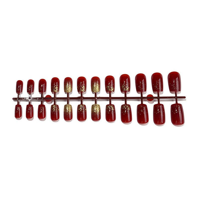Elegant Press-On Nail Set with Glamorous Gold Glitter Accents Acalora