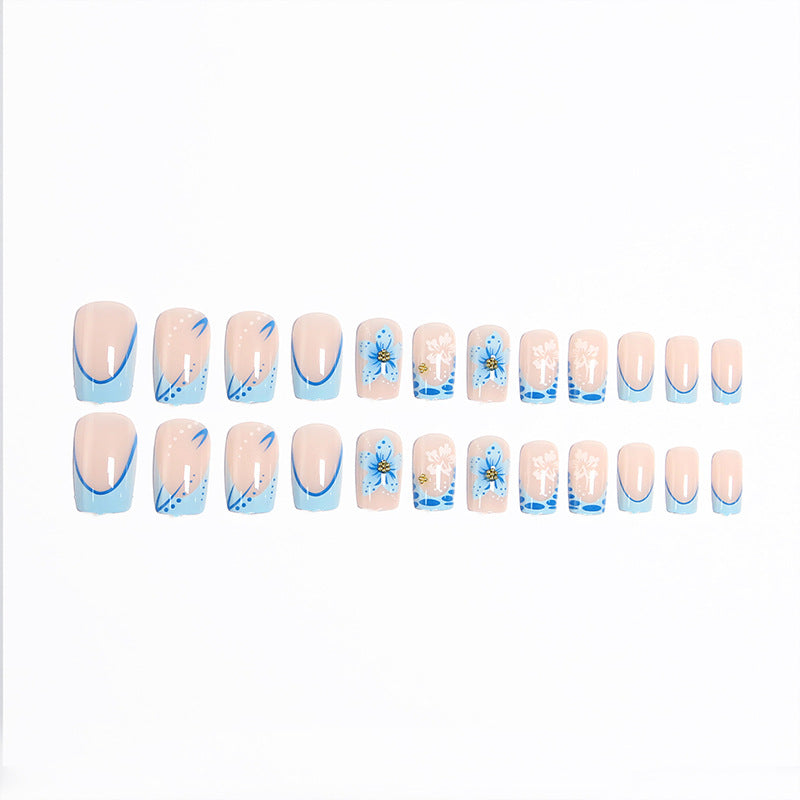 Acrylic nail set with exquisite floral and glitter accents Acalora