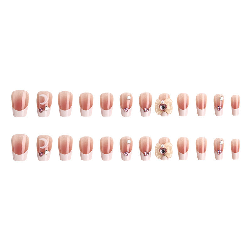 Artificial nail set with elegant floral decorations and glitter accents Acalora
