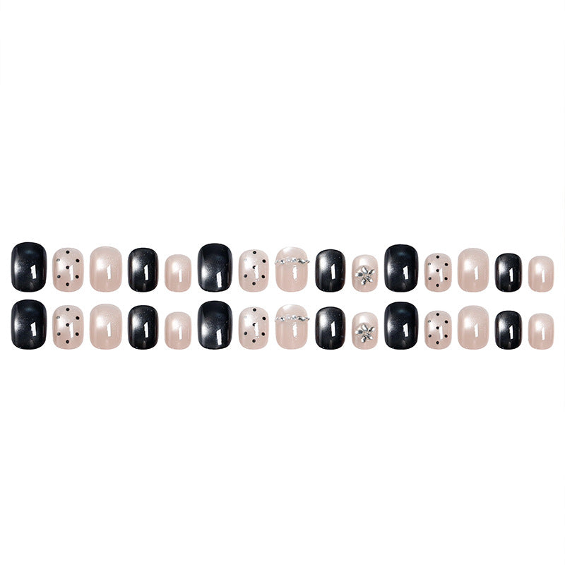 Acrylic nail set with glamorous accents and delicate designs Acalora