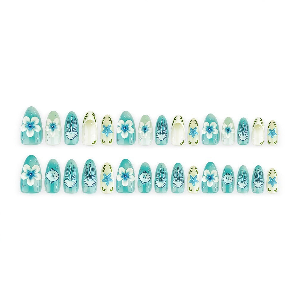 Artificial nails in a maritime design with colorful shell and water motifs Acalora