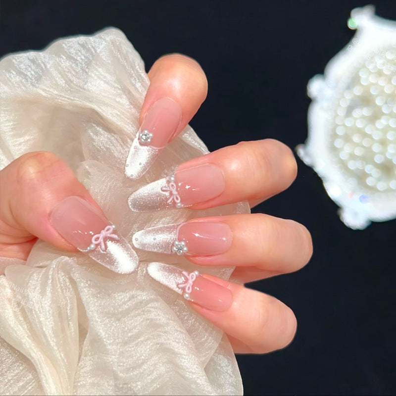 Artificial nail set with elegant bow and rhinestone embellishments Acalora