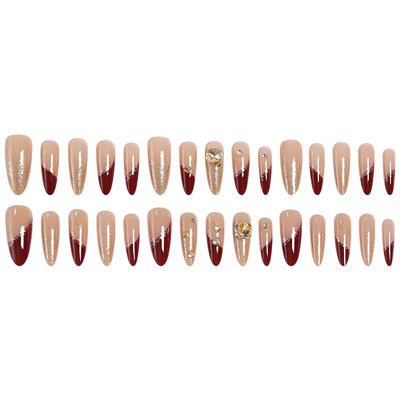 Acrylic nail set with elegant glitter design and exclusive embellishments Acalora