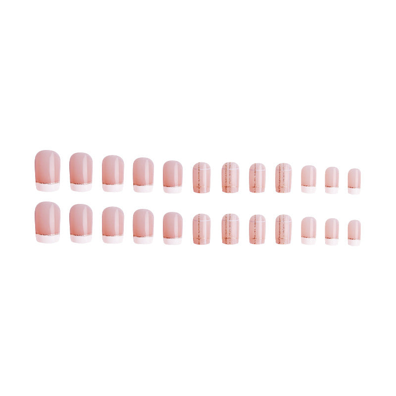 Nail set with elegant French tip and fashionable embellishments Acalora