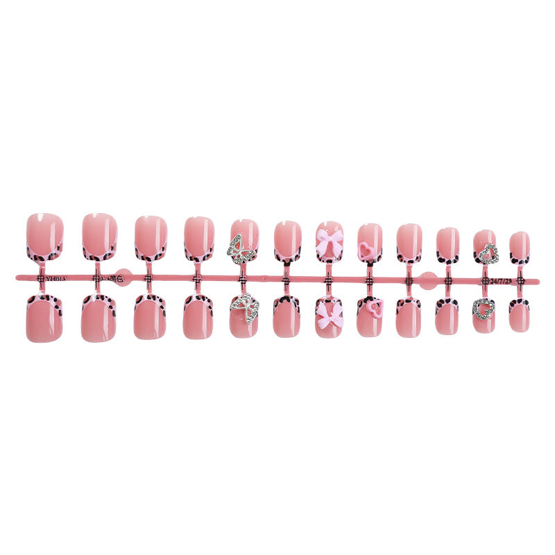 Decorative Press-On Nail Set with Artistic Bow and Heart Accents Acalora