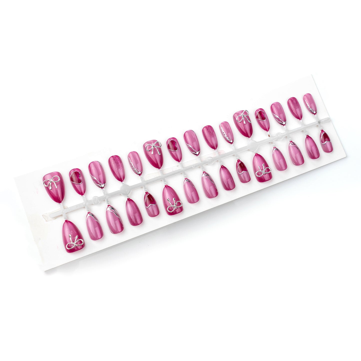 Acrylic nail set with elegant heart and bow decorations Acalora