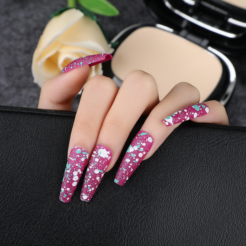Artistic splatter design artificial nails Acalora