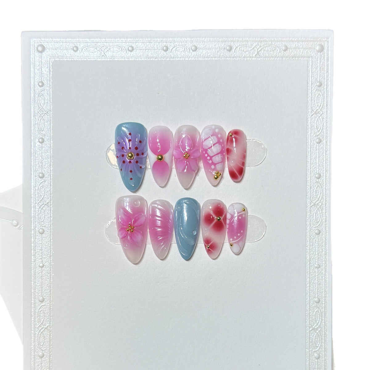 Artistic Press-On Nail Set with Floral and Abstract Designs Acalora