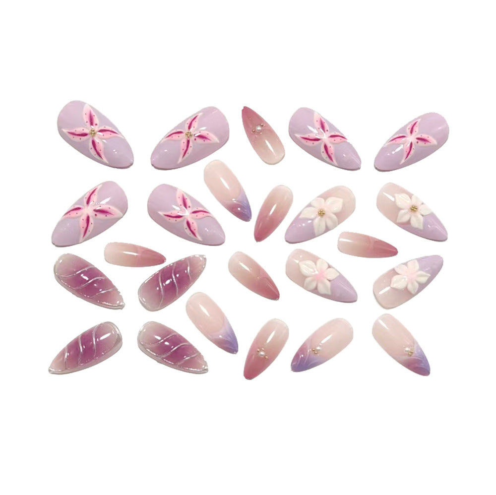 Artificial nails in elegant stiletto design with floral accent Acalora