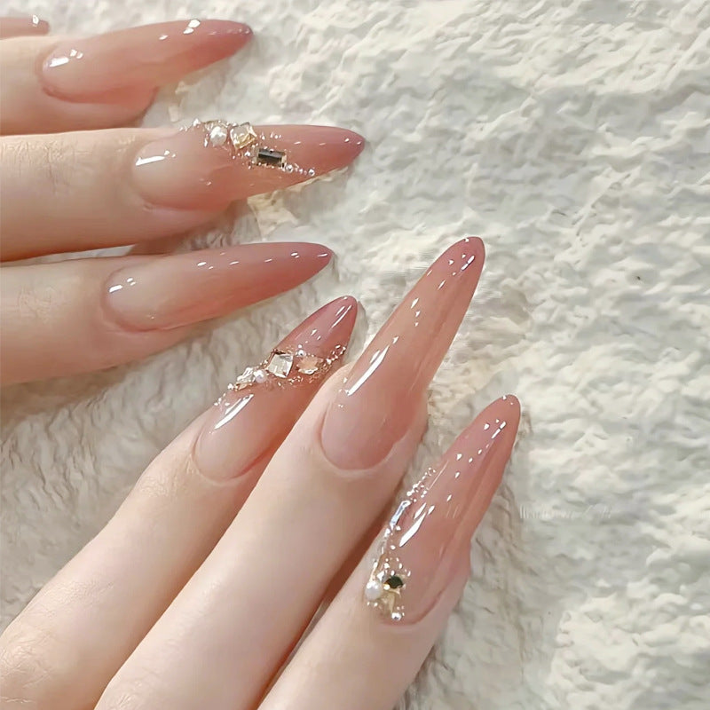 Artificial nail set with elegant ombre effect and glamorous embellishments Acalora