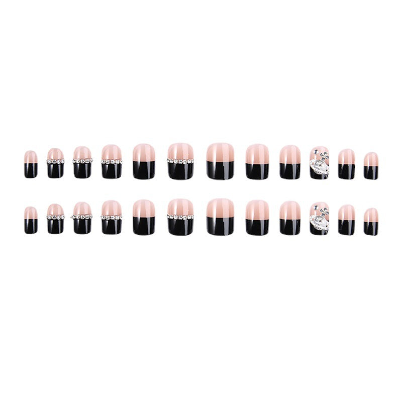 Glamorous artificial nail set with sparkling crystal embellishments Acalora