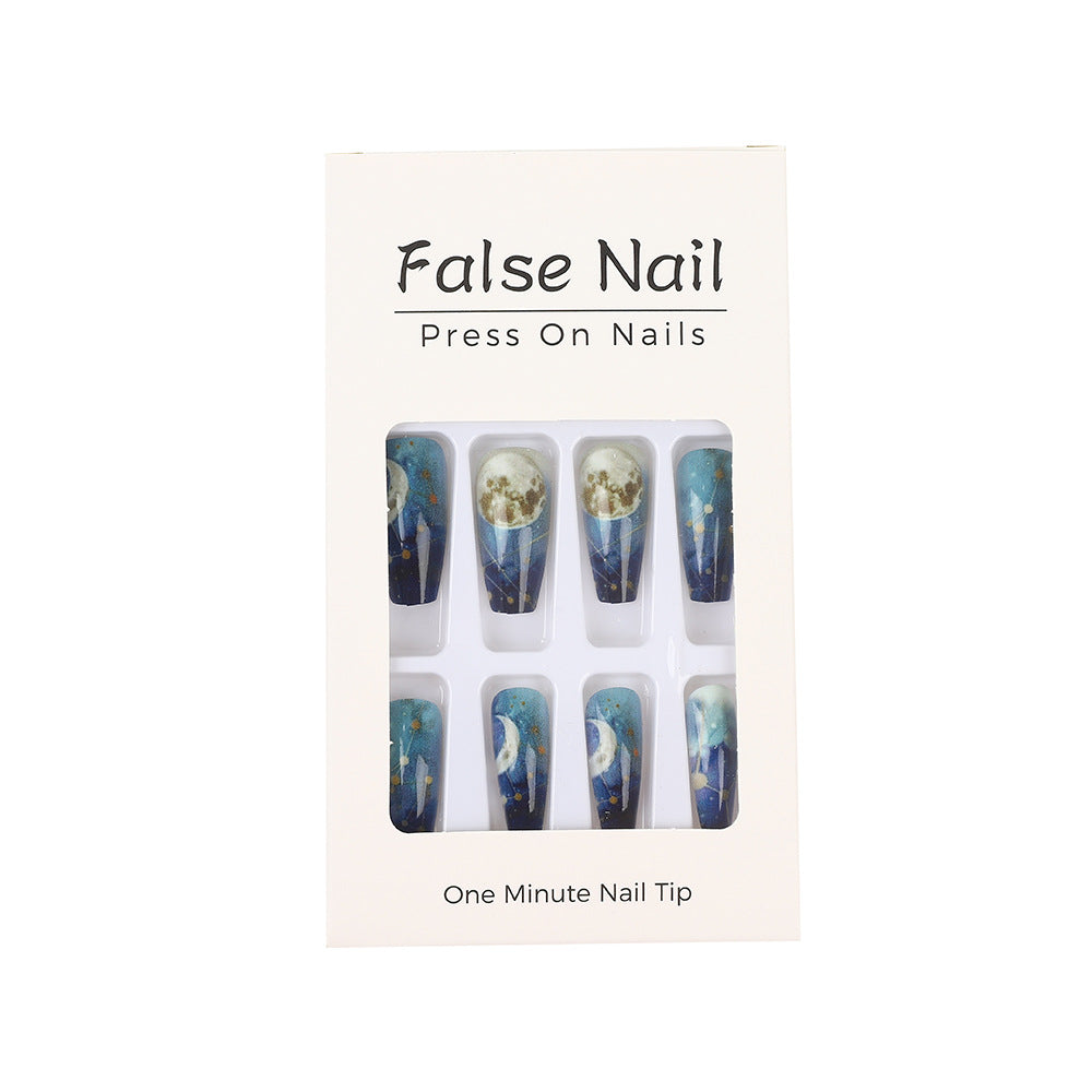 Dreamy artificial nails with moon and star design Acalora