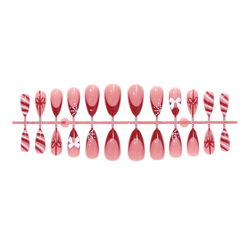 Decorative Press-On Nail Set with Elegant Bow and Striped Designs Acalora