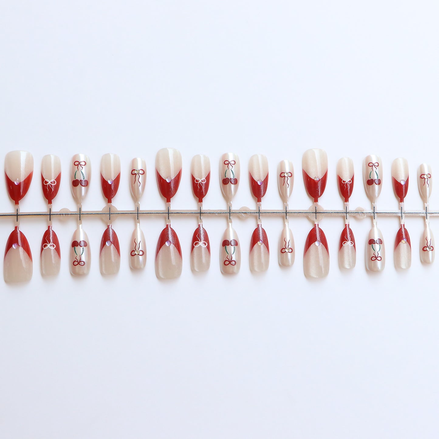 Artistic Press-On Nail Set with Cherry and Ribbon Design Acalora