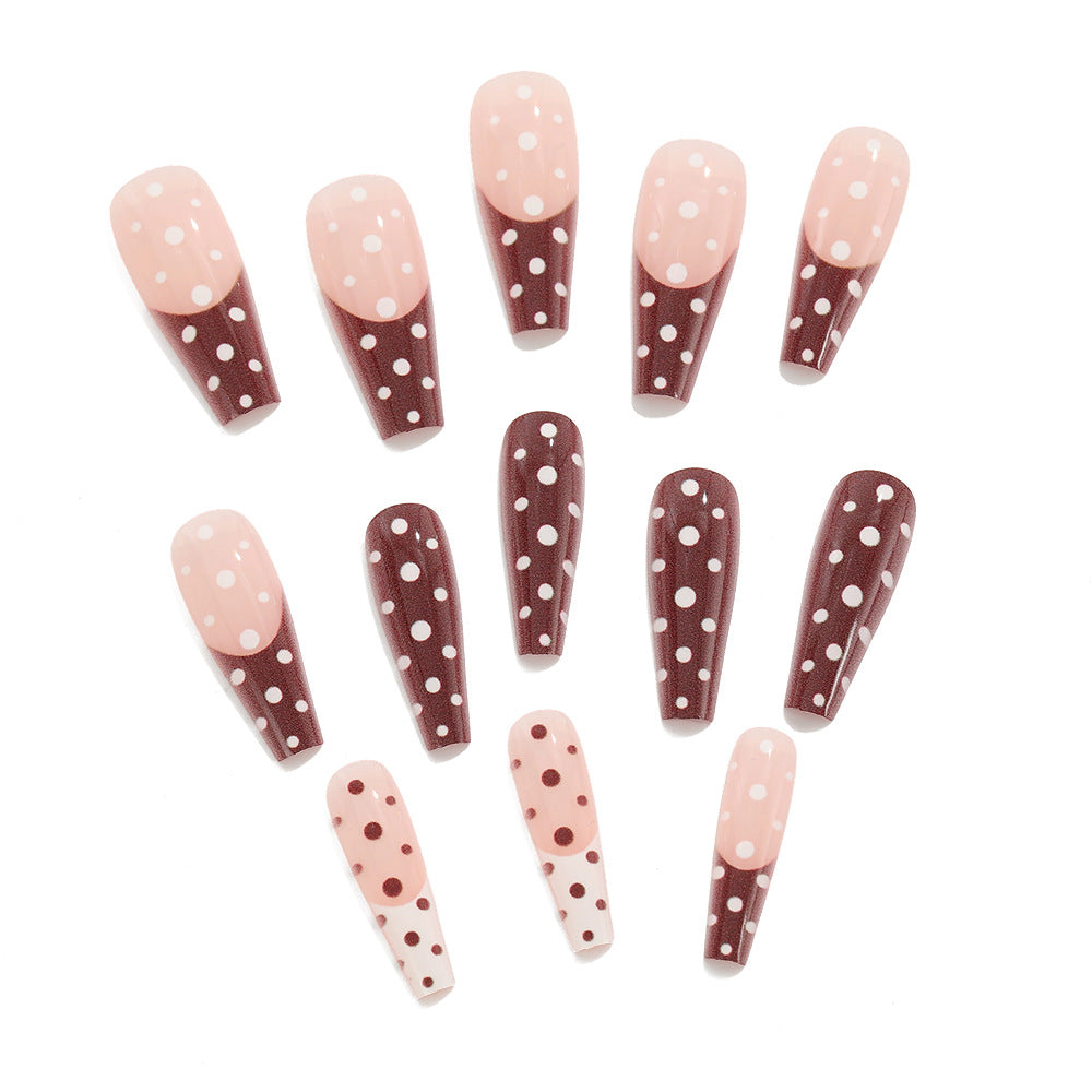 Artificial nails in the popular polka dot design Acalora