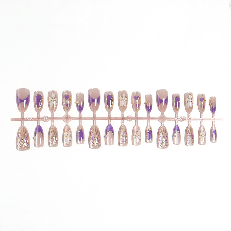 Artificial nail set with elegant flower and glitter details Acalora
