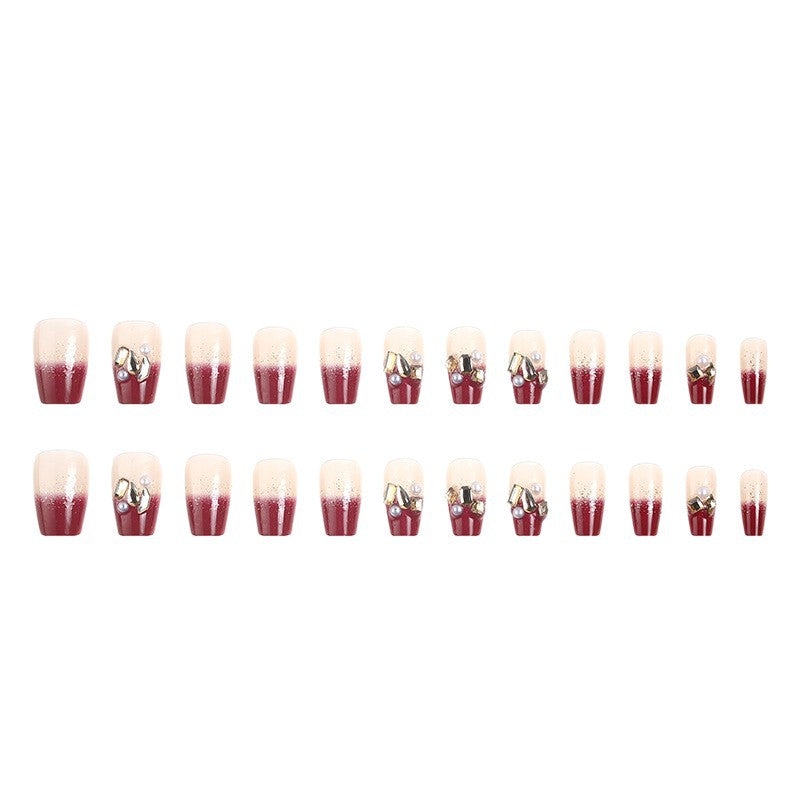 Acrylic nail set with elegant glitter and flower accents Acalora