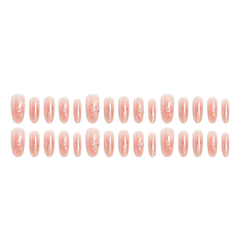 Acrylic nail set with filigree flower and glitter elements Acalora