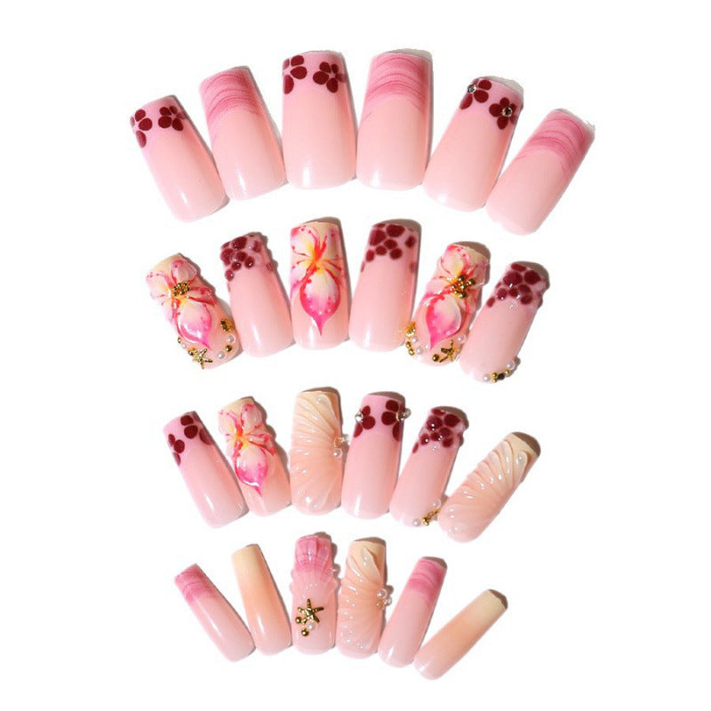 Acrylic nail set with exclusive flower design and sparkling accents Acalora