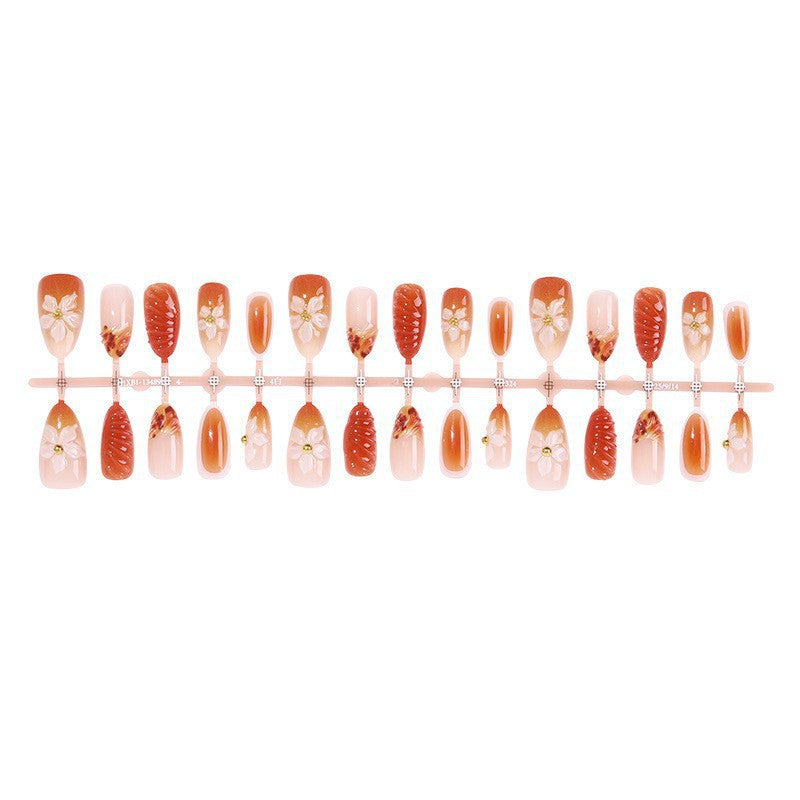 Artificial nail set with handcrafted flowers and elegant embellishments Acalora