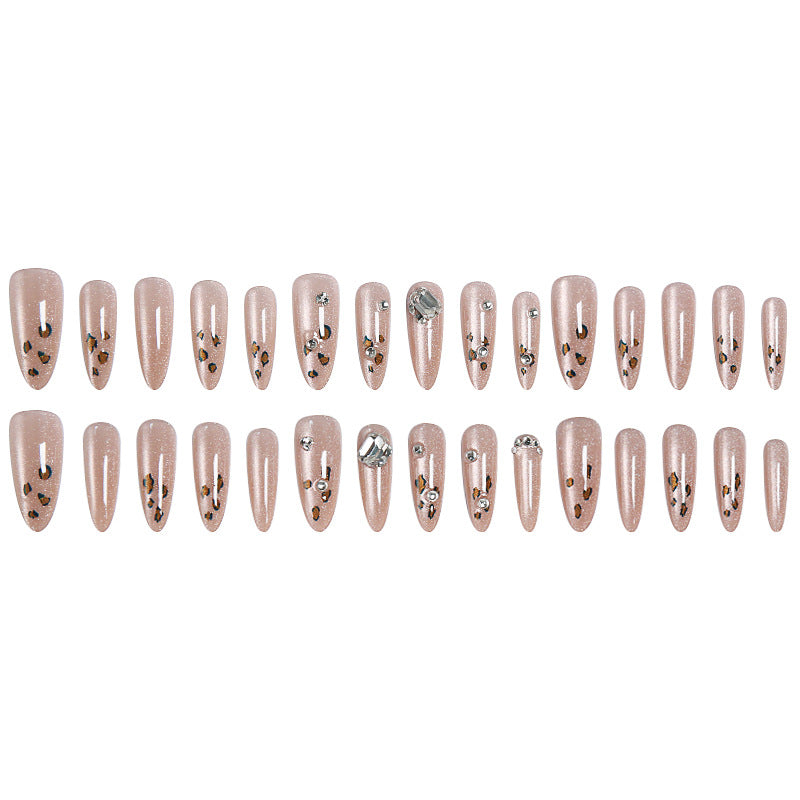 Glamorous artificial nail set with fun leopard pattern and glittering accents Acalora