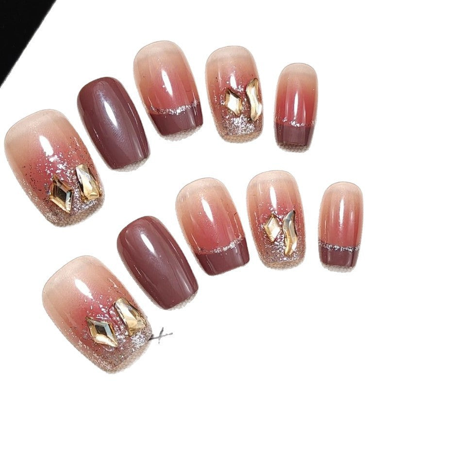 Acrylic nails in elegant ombre design with glitter elements Acalora