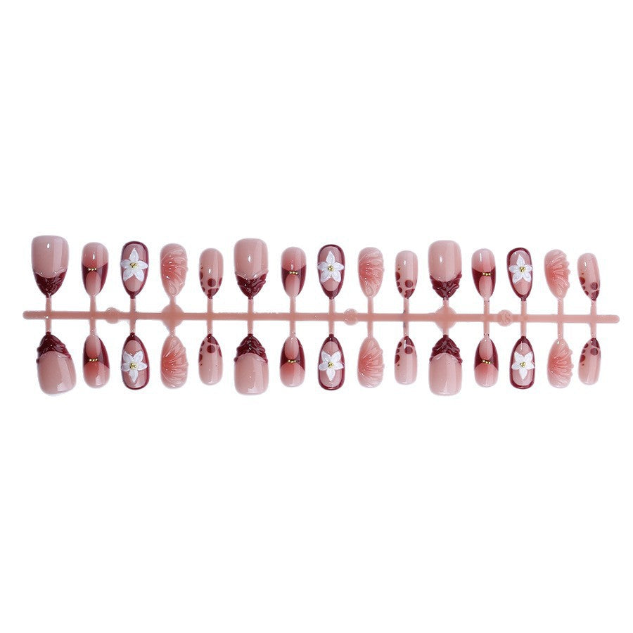 Artificial nail set with floral 3D applications and elegant gradient design Acalora