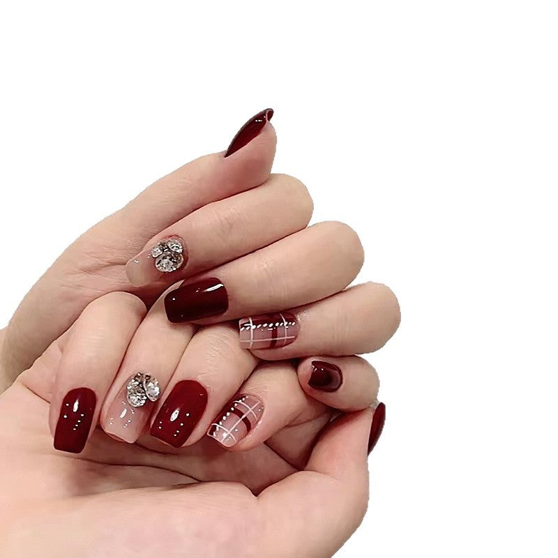 Artificial nail set with elegant, shimmering design and creative accents Acalora
