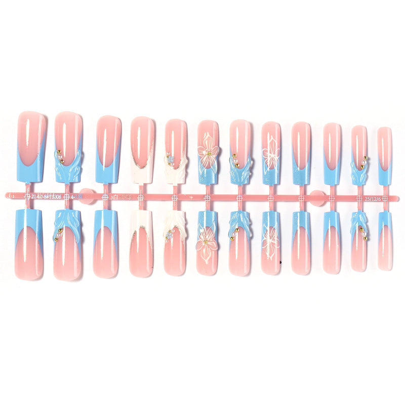 Artistic Nail Art Set with Floral and Glossy Accents Acalora
