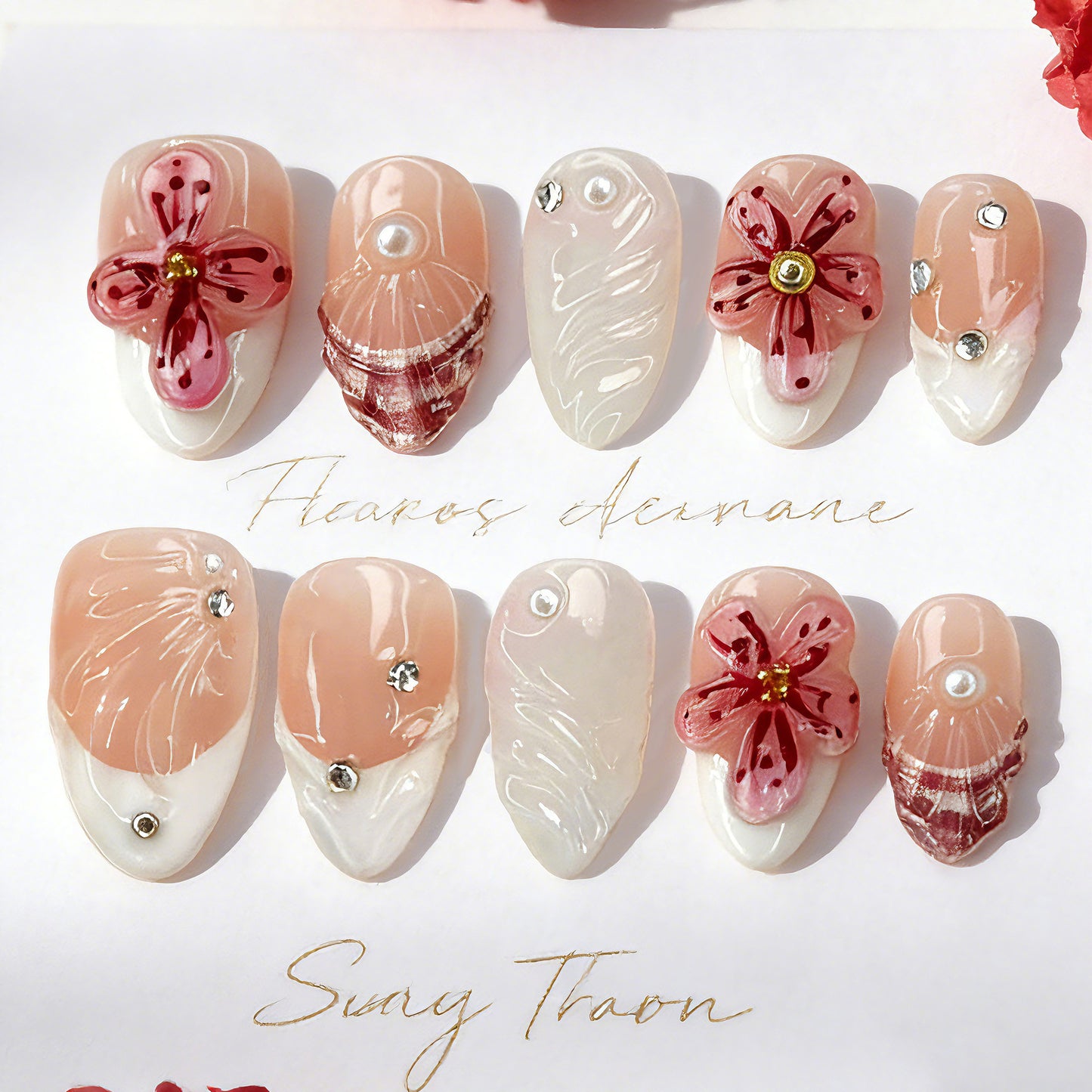 Artificial nails with handcrafted flower and glitter elements Acalora