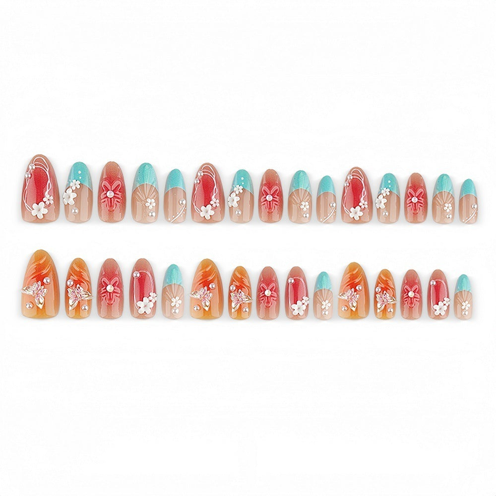 Artificial nail set with floral accents and glittering 3D applications Acalora