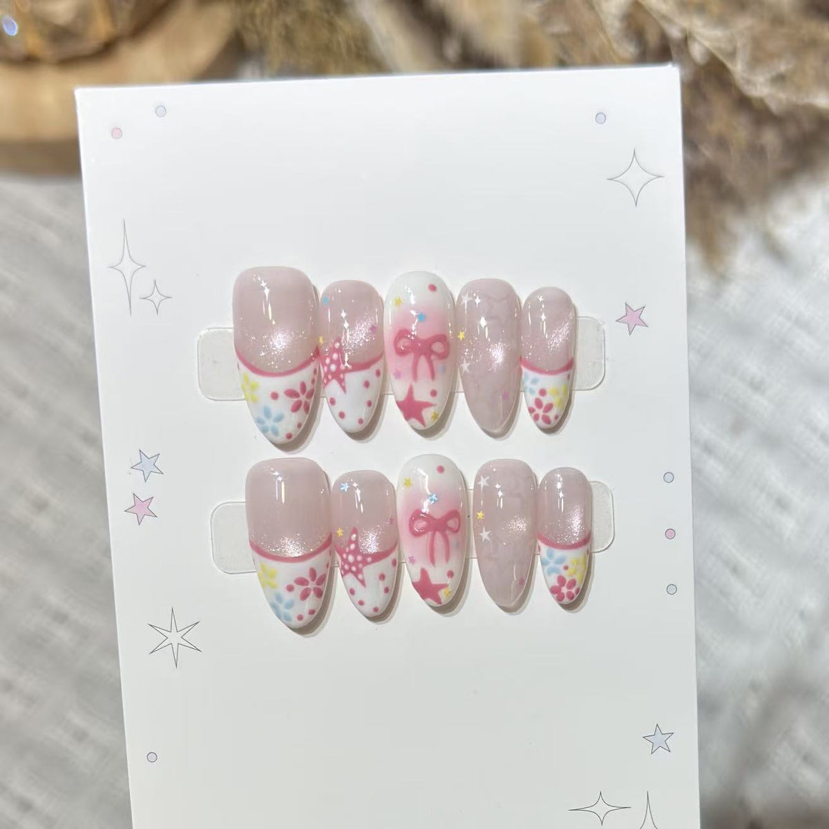 Artistic Press-On Nail Art Set with Charming Star and Bow Designs Acalora