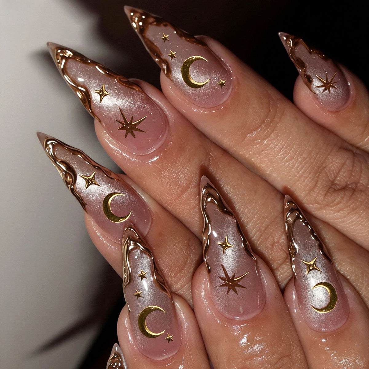 Artistic Stiletto Nail Art Tips with Celestial Accents Acalora