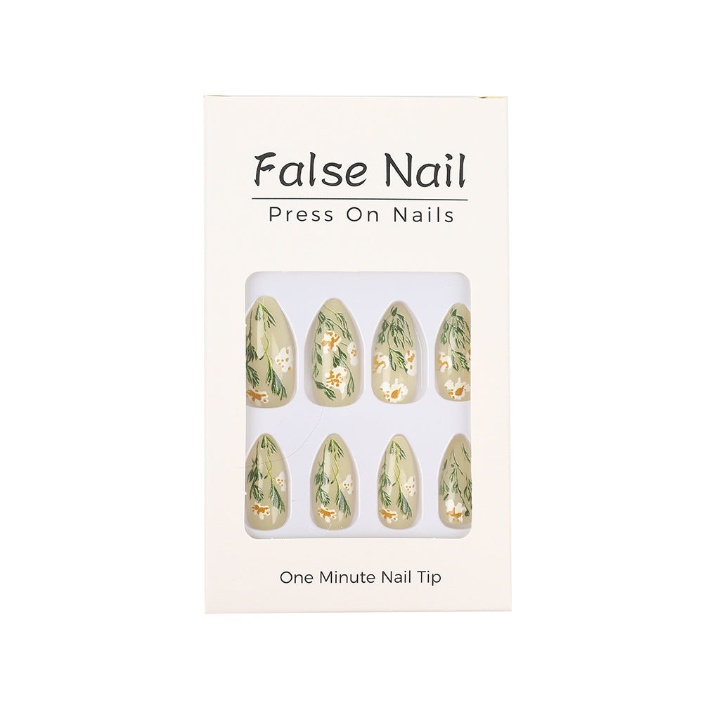 Handmade art nails with floral accents Acalora