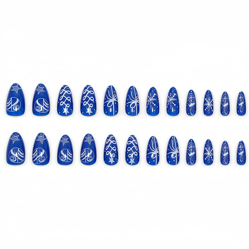 Artificial nails in festive winter design with glittering snowflakes and elegant decorations Acalora
