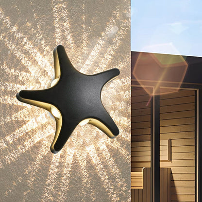 Modern, simple LED wall light made of aluminum in starfish design, waterproof, for the patio