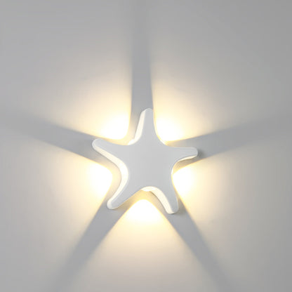Modern, simple LED wall light made of aluminum in starfish design, waterproof, for the patio