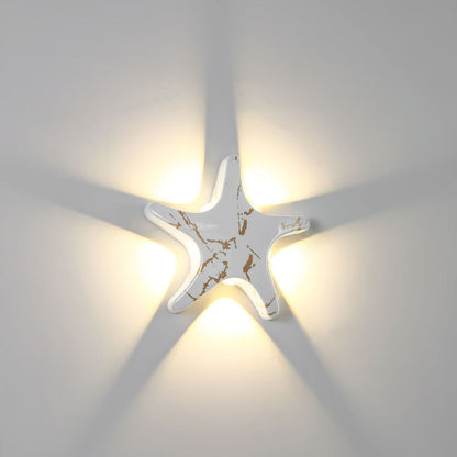 Modern, simple LED wall light made of aluminum in starfish design, waterproof, for the patio
