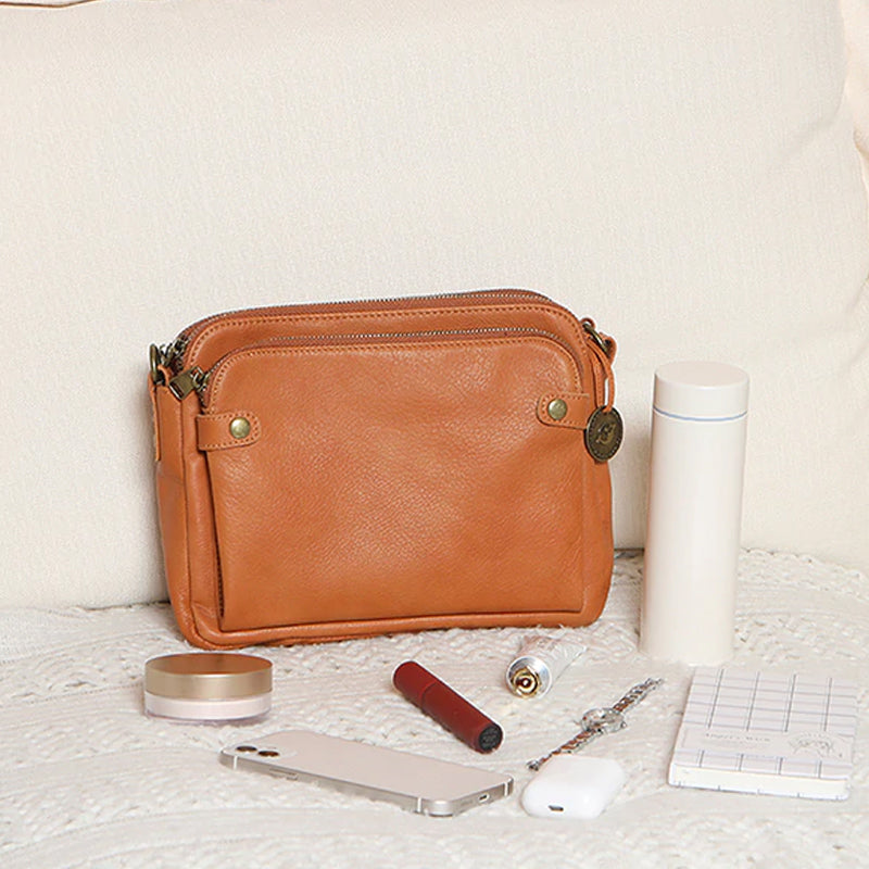 Skanto | Three-layer leather crossover shoulder and clutch bag