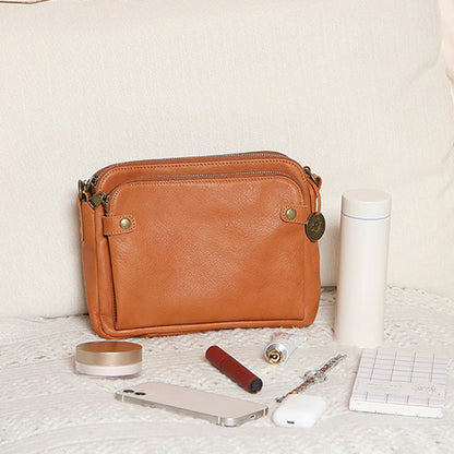Skanto | Three-layer leather crossover shoulder and clutch bag