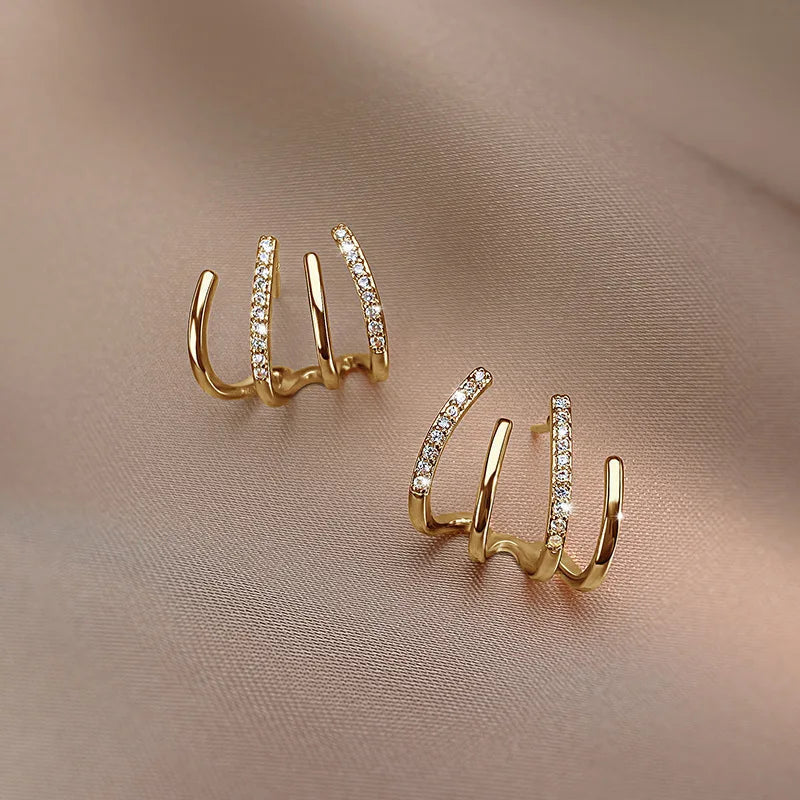 Skanto | Twisted Earrings | Elegant Design | Gold or Silver