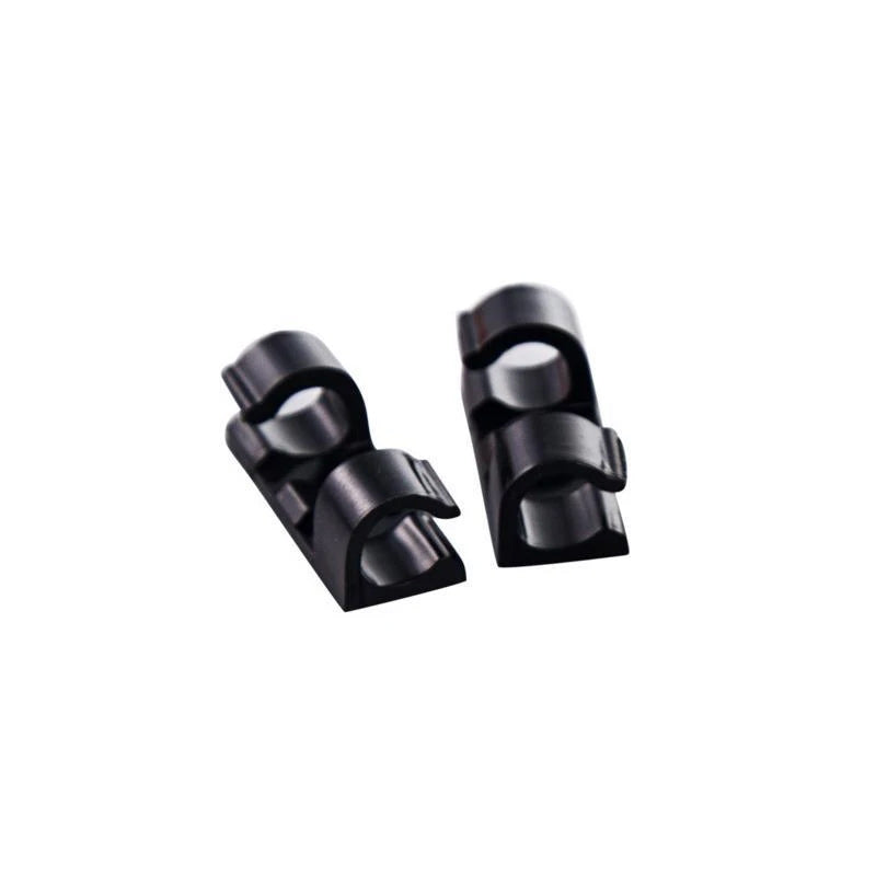 Self-adhesive plastic wire/cable clips | Karnz