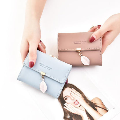 Short trifold wallet with leaf detail | Skanto