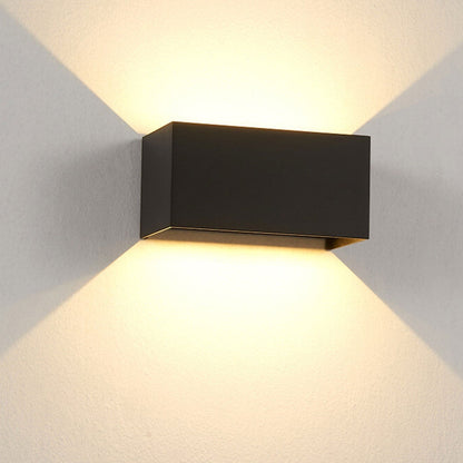 Modern, waterproof, rectangular outdoor LED wall light with up and down lighting.