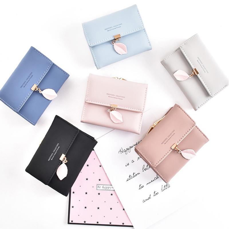 Short trifold wallet with leaf detail | Skanto
