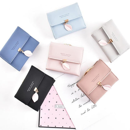 Short trifold wallet with leaf detail | Skanto
