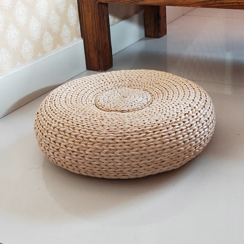 Handcrafted sitting pouf made of natural material Acalora