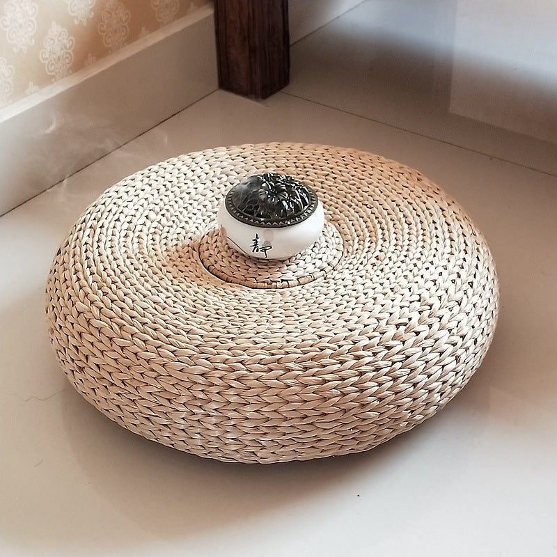 Handcrafted sitting pouf made of natural material Acalora